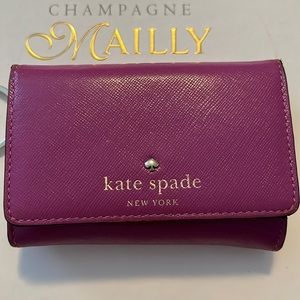 Kate Spade purple wallet.